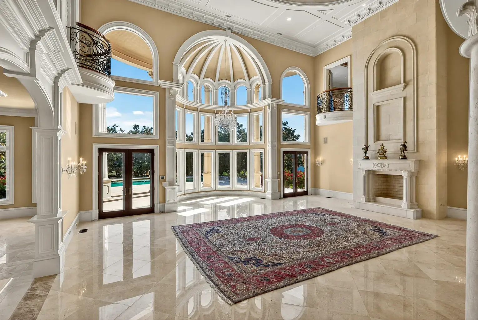 Two-storey great room with domed rotunda and chandelier